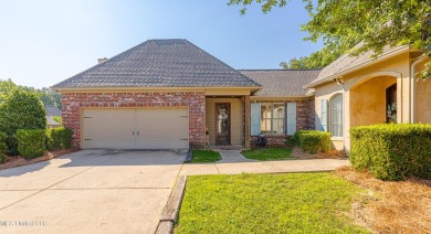 This spacious 4 bedroom, 3 bathroom home is situated in the on Lake Caroline Golf Club in Mississippi - for sale on GolfHomes.com, golf home, golf lot