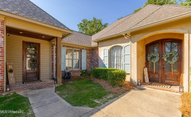 This spacious 4 bedroom, 3 bathroom home is situated in the on Lake Caroline Golf Club in Mississippi - for sale on GolfHomes.com, golf home, golf lot