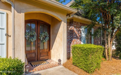 This spacious 4 bedroom, 3 bathroom home is situated in the on Lake Caroline Golf Club in Mississippi - for sale on GolfHomes.com, golf home, golf lot