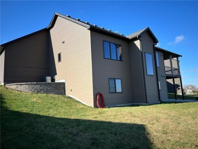 Stunning 4-bedroom, 3-bathroom luxury home situated on a serene on Zumbrota Golf Club in Minnesota - for sale on GolfHomes.com, golf home, golf lot