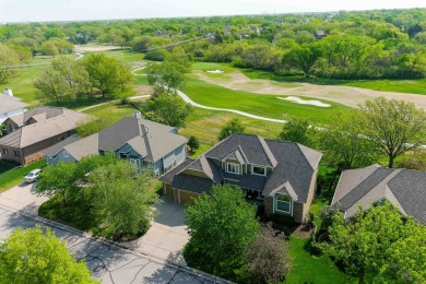 Golf course views! This idyllic location provides a haven for on Tallgrass Country Club in Kansas - for sale on GolfHomes.com, golf home, golf lot