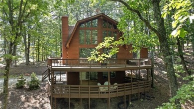 A Tranquil Woodland Escape in Lake Arrowhead awaits the lucky on The Highlands Course at Lake Arrowhead in Georgia - for sale on GolfHomes.com, golf home, golf lot