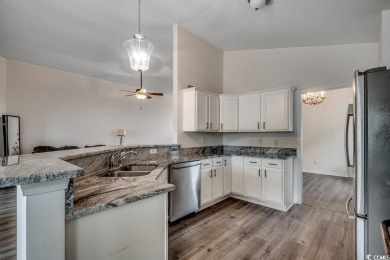 This beautifully maintained three-bedroom home offers a seamless on Heron Point Golf Club in South Carolina - for sale on GolfHomes.com, golf home, golf lot