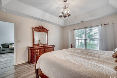 This beautifully maintained three-bedroom home offers a seamless on Heron Point Golf Club in South Carolina - for sale on GolfHomes.com, golf home, golf lot