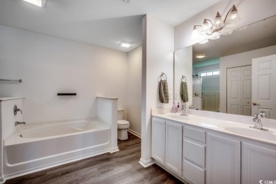 This beautifully maintained three-bedroom home offers a seamless on Heron Point Golf Club in South Carolina - for sale on GolfHomes.com, golf home, golf lot