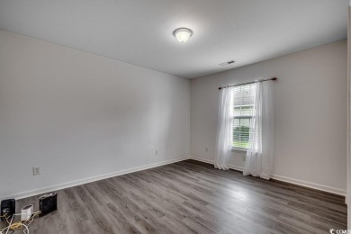 This beautifully maintained three-bedroom home offers a seamless on Heron Point Golf Club in South Carolina - for sale on GolfHomes.com, golf home, golf lot