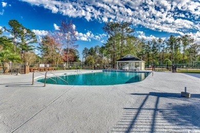 This beautifully maintained three-bedroom home offers a seamless on Heron Point Golf Club in South Carolina - for sale on GolfHomes.com, golf home, golf lot