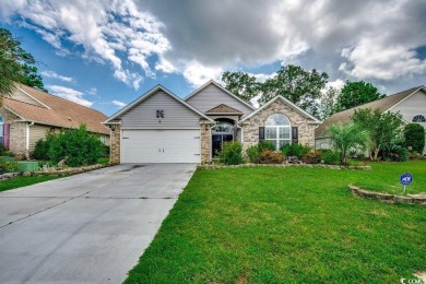 This beautifully maintained three-bedroom home offers a seamless on Heron Point Golf Club in South Carolina - for sale on GolfHomes.com, golf home, golf lot