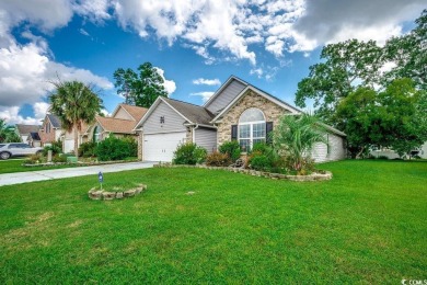 This beautifully maintained three-bedroom home offers a seamless on Heron Point Golf Club in South Carolina - for sale on GolfHomes.com, golf home, golf lot