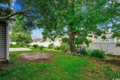 This beautifully maintained three-bedroom home offers a seamless on Heron Point Golf Club in South Carolina - for sale on GolfHomes.com, golf home, golf lot