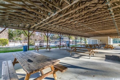 This beautifully maintained three-bedroom home offers a seamless on Heron Point Golf Club in South Carolina - for sale on GolfHomes.com, golf home, golf lot