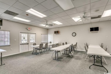 This beautifully maintained three-bedroom home offers a seamless on Heron Point Golf Club in South Carolina - for sale on GolfHomes.com, golf home, golf lot