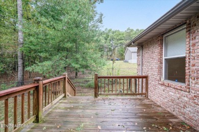 This beautiful brick BASEMENT RANCH home, nestled on 2 lots in on Lake Tansi Village Country Club in Tennessee - for sale on GolfHomes.com, golf home, golf lot