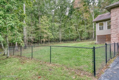 This beautiful brick BASEMENT RANCH home, nestled on 2 lots in on Lake Tansi Village Country Club in Tennessee - for sale on GolfHomes.com, golf home, golf lot