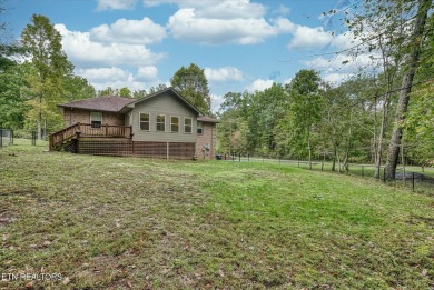 This beautiful brick BASEMENT RANCH home, nestled on 2 lots in on Lake Tansi Village Country Club in Tennessee - for sale on GolfHomes.com, golf home, golf lot