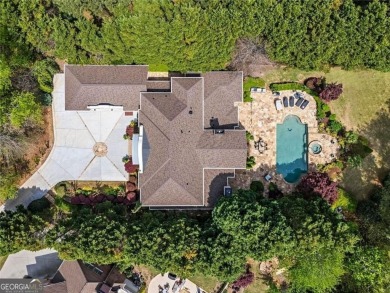Welcome to an extraordinary six-bedroom, seven full and two on The Golf Club of Georgia in Georgia - for sale on GolfHomes.com, golf home, golf lot