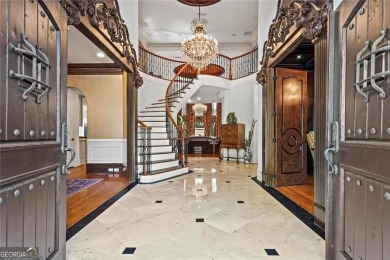 Welcome to an extraordinary six-bedroom, seven full and two on The Golf Club of Georgia in Georgia - for sale on GolfHomes.com, golf home, golf lot