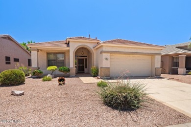 Nestled within the guard-gated 55+ community of Arizona on Arizona Traditions Golf Club in Arizona - for sale on GolfHomes.com, golf home, golf lot