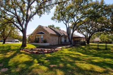 This charming home features fresh paint and new flooring on Lake Kiowa Golf Course in Texas - for sale on GolfHomes.com, golf home, golf lot