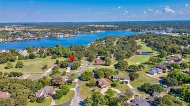 This charming home features fresh paint and new flooring on Lake Kiowa Golf Course in Texas - for sale on GolfHomes.com, golf home, golf lot