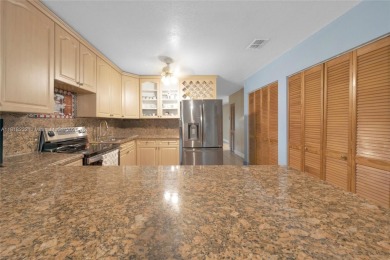 Welcome to 7517 N Augusta Drive, a beautifully maintained 3-bed on Country Club of Miami in Florida - for sale on GolfHomes.com, golf home, golf lot