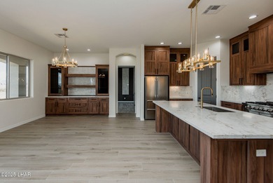 Stunning New Construction on the Los Lagos Golf Course! This on Los Lagos Golf Club in Arizona - for sale on GolfHomes.com, golf home, golf lot