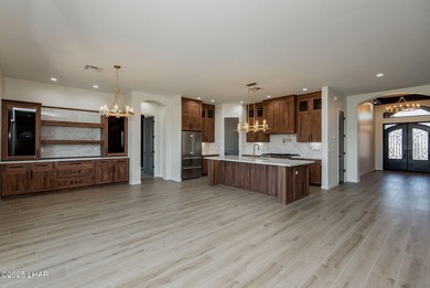 Stunning New Construction on the Los Lagos Golf Course! This on Los Lagos Golf Club in Arizona - for sale on GolfHomes.com, golf home, golf lot