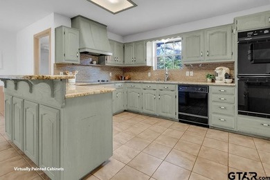 PRICE REDUCED TO $394,500!!!   Set on a beautifully landscaped on Hide-A-Way Lake Golf Course in Texas - for sale on GolfHomes.com, golf home, golf lot