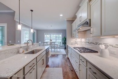 Built in 2020, this stunning 3,056 sq ft all-brick residence on Compass Pointe Golf Course in North Carolina - for sale on GolfHomes.com, golf home, golf lot