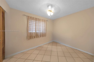 Welcome to 7517 N Augusta Drive, a beautifully maintained 3-bed on Country Club of Miami in Florida - for sale on GolfHomes.com, golf home, golf lot