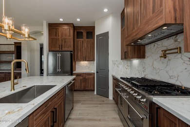 Stunning New Construction on the Los Lagos Golf Course! This on Los Lagos Golf Club in Arizona - for sale on GolfHomes.com, golf home, golf lot