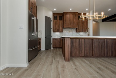 Stunning New Construction on the Los Lagos Golf Course! This on Los Lagos Golf Club in Arizona - for sale on GolfHomes.com, golf home, golf lot