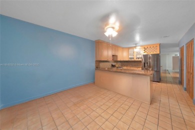 Welcome to 7517 N Augusta Drive, a beautifully maintained 3-bed on Country Club of Miami in Florida - for sale on GolfHomes.com, golf home, golf lot
