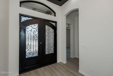 Stunning New Construction on the Los Lagos Golf Course! This on Los Lagos Golf Club in Arizona - for sale on GolfHomes.com, golf home, golf lot