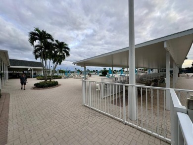 Nice spacious 2 bedroom, 2 bathroom needs some love . Washer and on Kings Point Golf -Flanders Way in Florida - for sale on GolfHomes.com, golf home, golf lot