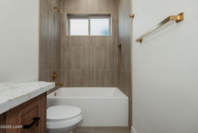 Stunning New Construction on the Los Lagos Golf Course! This on Los Lagos Golf Club in Arizona - for sale on GolfHomes.com, golf home, golf lot