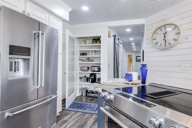 Stunning Waterfront Home in Sutherland Bluff! Pictures don't do on Sapelo Hammock Golf Club in Georgia - for sale on GolfHomes.com, golf home, golf lot