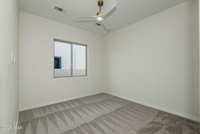 Stunning New Construction on the Los Lagos Golf Course! This on Los Lagos Golf Club in Arizona - for sale on GolfHomes.com, golf home, golf lot