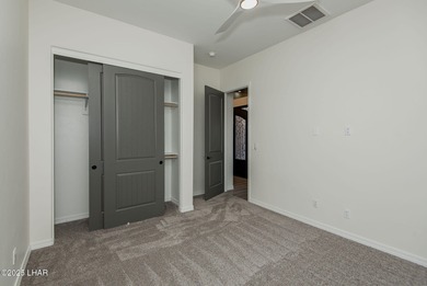 Stunning New Construction on the Los Lagos Golf Course! This on Los Lagos Golf Club in Arizona - for sale on GolfHomes.com, golf home, golf lot