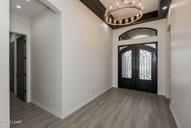 Stunning New Construction on the Los Lagos Golf Course! This on Los Lagos Golf Club in Arizona - for sale on GolfHomes.com, golf home, golf lot