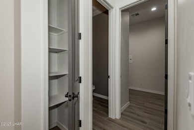 Stunning New Construction on the Los Lagos Golf Course! This on Los Lagos Golf Club in Arizona - for sale on GolfHomes.com, golf home, golf lot