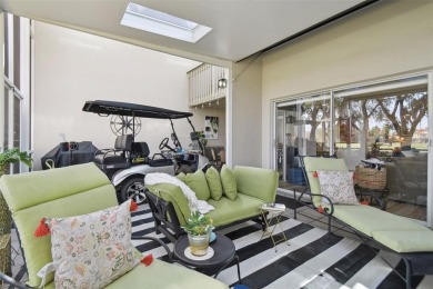 This townhouse is located on Meadow #1 of the Carrollwood on Carrollwood Country Club in Florida - for sale on GolfHomes.com, golf home, golf lot