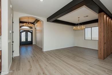 Stunning New Construction on the Los Lagos Golf Course! This on Los Lagos Golf Club in Arizona - for sale on GolfHomes.com, golf home, golf lot