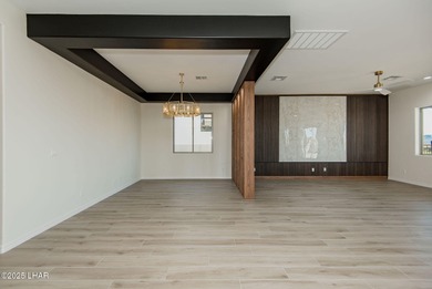 Stunning New Construction on the Los Lagos Golf Course! This on Los Lagos Golf Club in Arizona - for sale on GolfHomes.com, golf home, golf lot