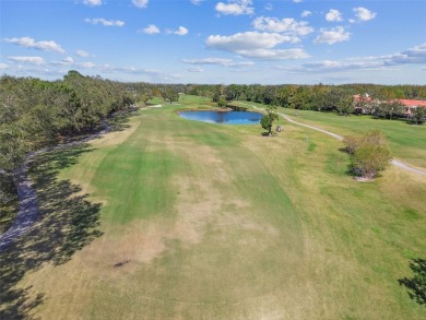 This townhouse is located on Meadow #1 of the Carrollwood on Carrollwood Country Club in Florida - for sale on GolfHomes.com, golf home, golf lot