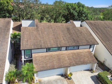 This townhouse is located on Meadow #1 of the Carrollwood on Carrollwood Country Club in Florida - for sale on GolfHomes.com, golf home, golf lot