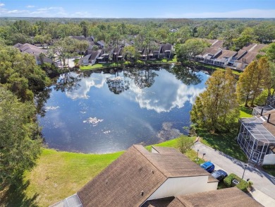 This townhouse is located on Meadow #1 of the Carrollwood on Carrollwood Country Club in Florida - for sale on GolfHomes.com, golf home, golf lot