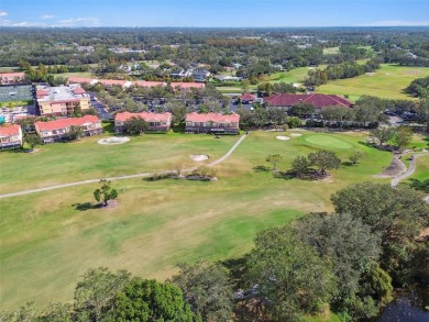 This townhouse is located on Meadow #1 of the Carrollwood on Carrollwood Country Club in Florida - for sale on GolfHomes.com, golf home, golf lot