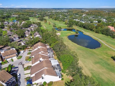 This townhouse is located on Meadow #1 of the Carrollwood on Carrollwood Country Club in Florida - for sale on GolfHomes.com, golf home, golf lot