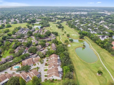 This townhouse is located on Meadow #1 of the Carrollwood on Carrollwood Country Club in Florida - for sale on GolfHomes.com, golf home, golf lot